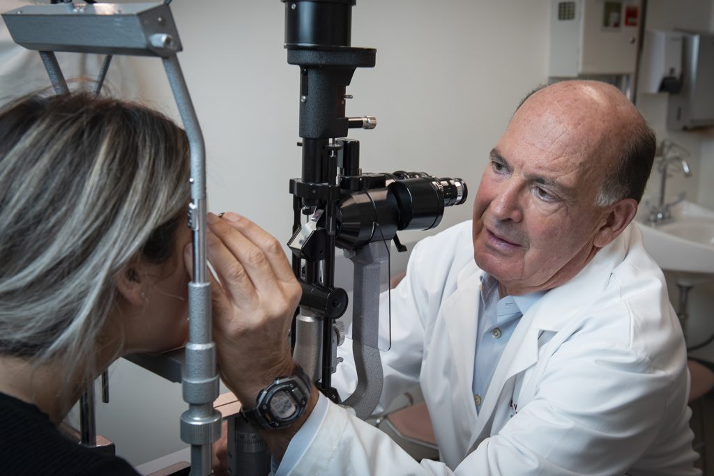 Image of Dr. Ross Examines a Patient