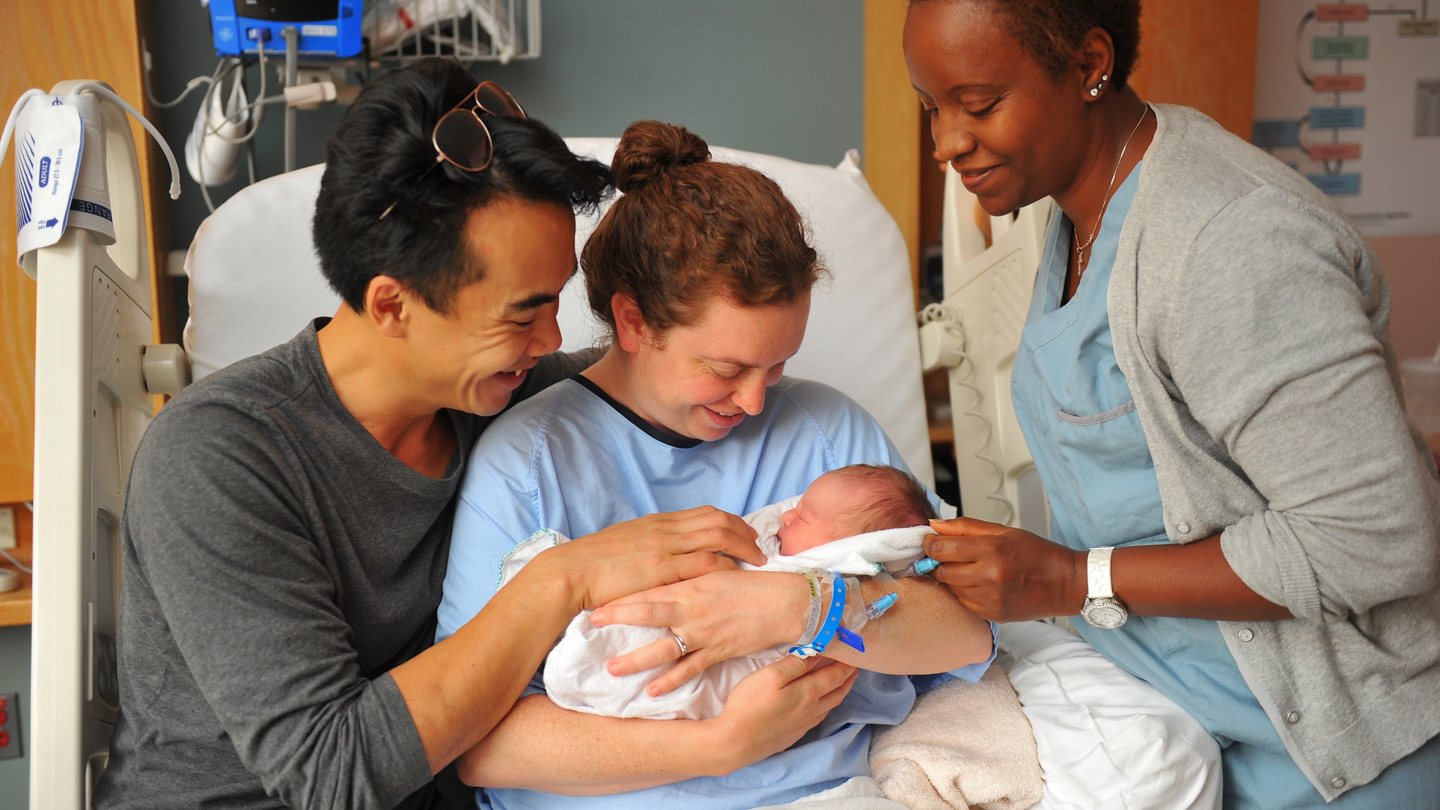 Newborn with parents