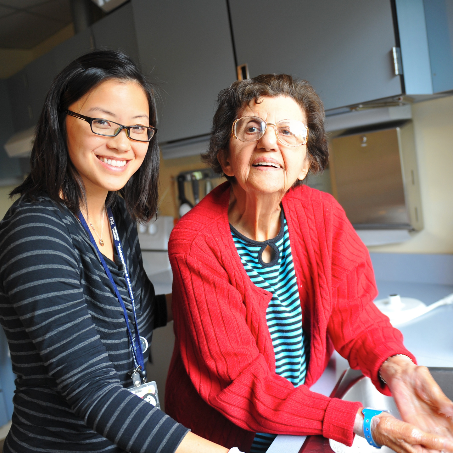 Holy Family resident with caregiver.