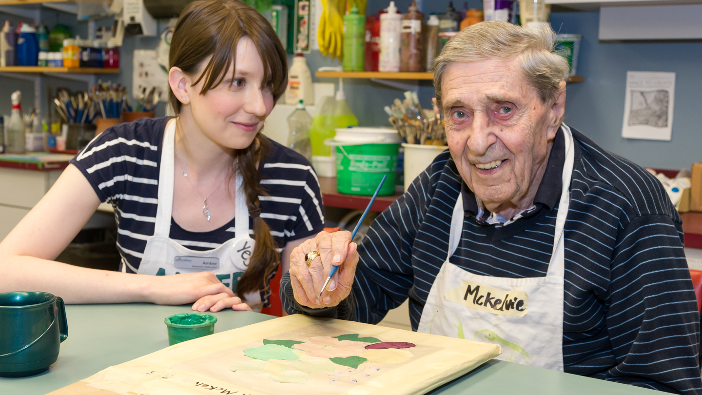 A resident participates in the Art Works program at Brock Fahrni.