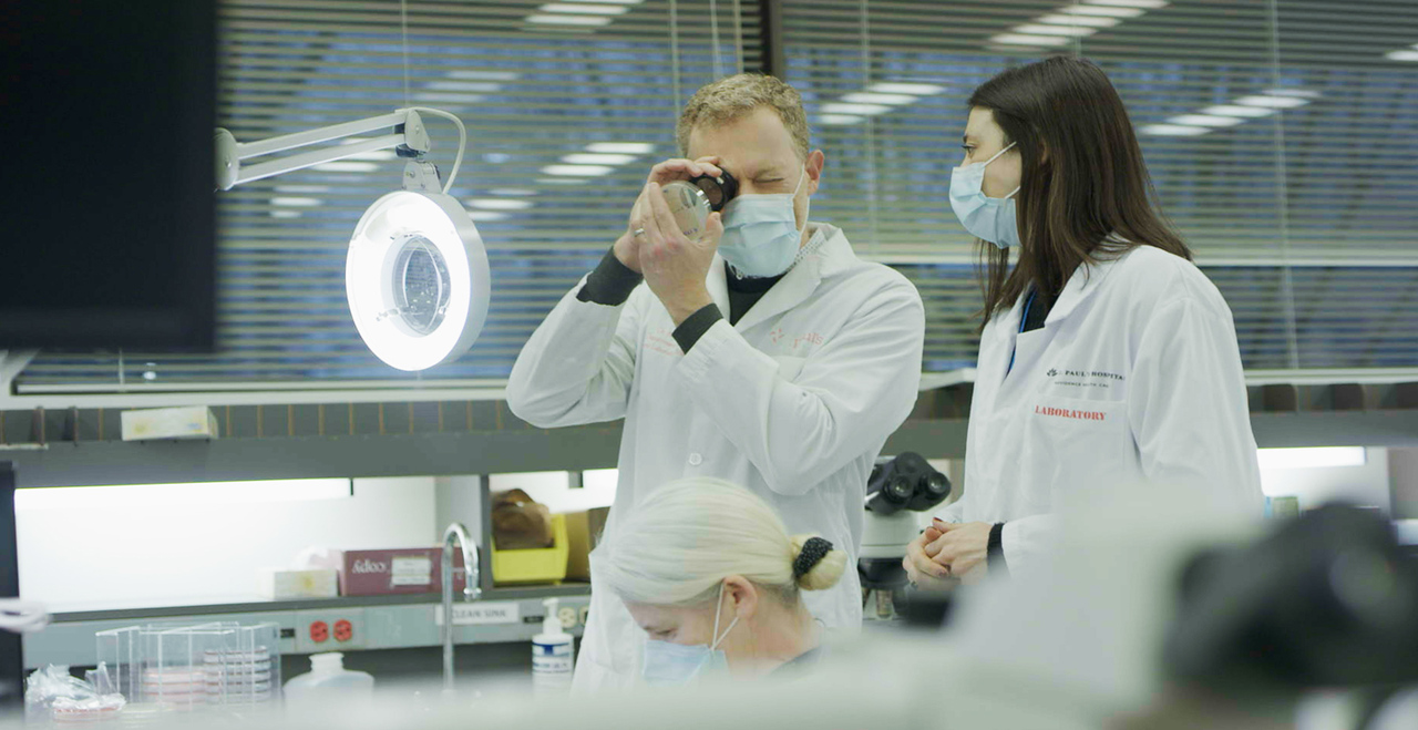 Image of Researcher Examining Sample