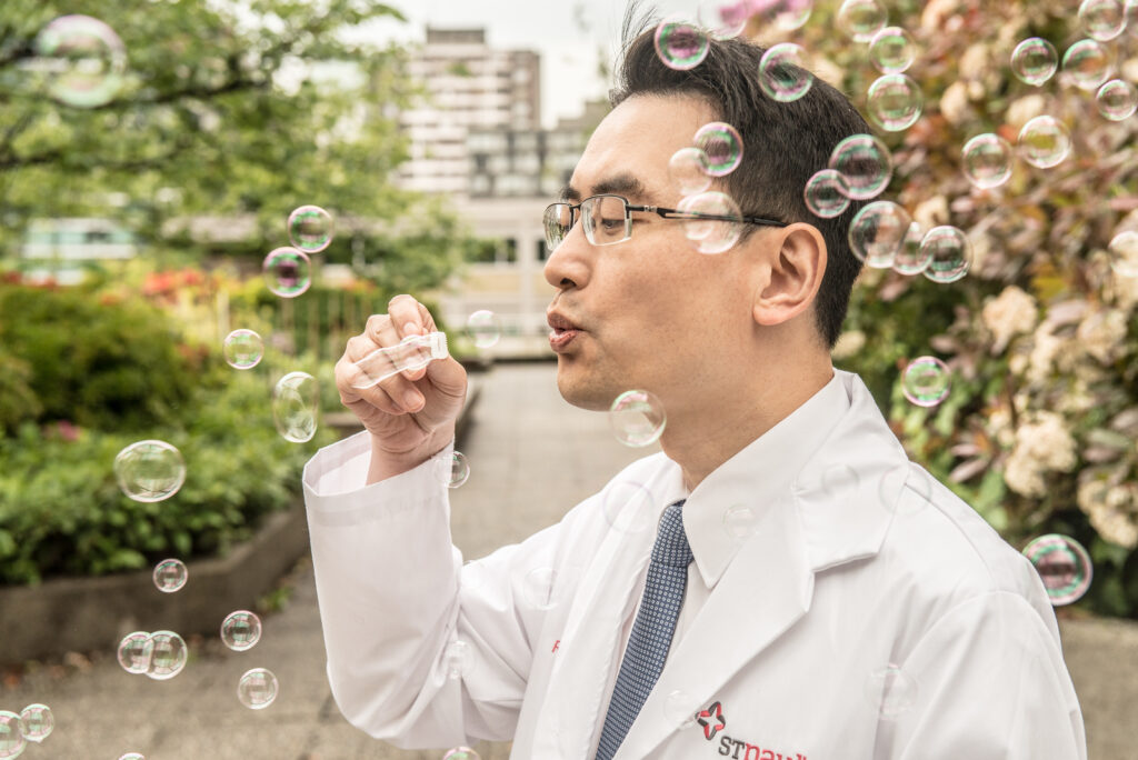 Image of Dr. Don Sin blowing bubbles